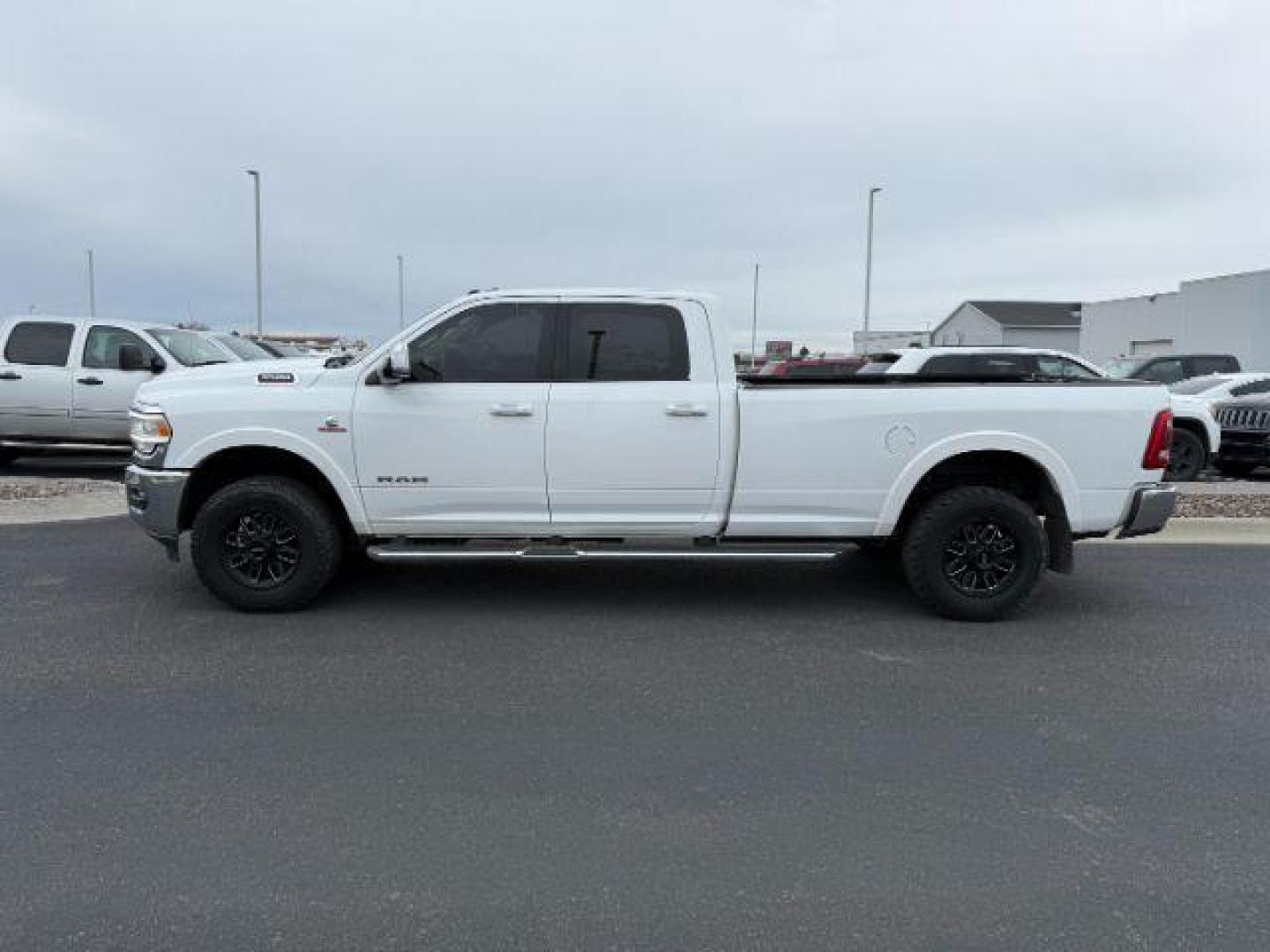2020 Bright White Clearcoat /Black Ram 3500 (3C63R3JL8LG) with an Cummins High Output 67L I-6 diesel direct injecti engine, Automatic transmission, located at 1175 N Woodruff Ave, Idaho Falls, ID, 83401, 43.506901, -111.999657 - At Timberline Auto, finding a great deal on your next vehicle is always easy! Our experienced sales staff's goal is to help find you the right vehicle at the right price! Our knowledgeable finance department has options for almost any credit score. We offer extended service contract options to prote - Photo#1