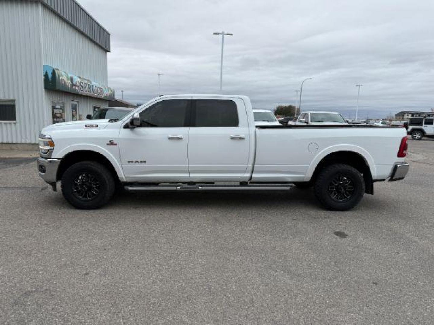 2020 Bright White Clearcoat /Black Ram 3500 (3C63R3JL8LG) with an Cummins High Output 67L I-6 diesel direct injecti engine, Automatic transmission, located at 1175 N Woodruff Ave, Idaho Falls, ID, 83401, 43.506901, -111.999657 - At Timberline Auto, finding a great deal on your next vehicle is always easy! Our experienced sales staff's goal is to help find you the right vehicle at the right price! Our knowledgeable finance department has options for almost any credit score. We offer extended service contract options to prote - Photo#28