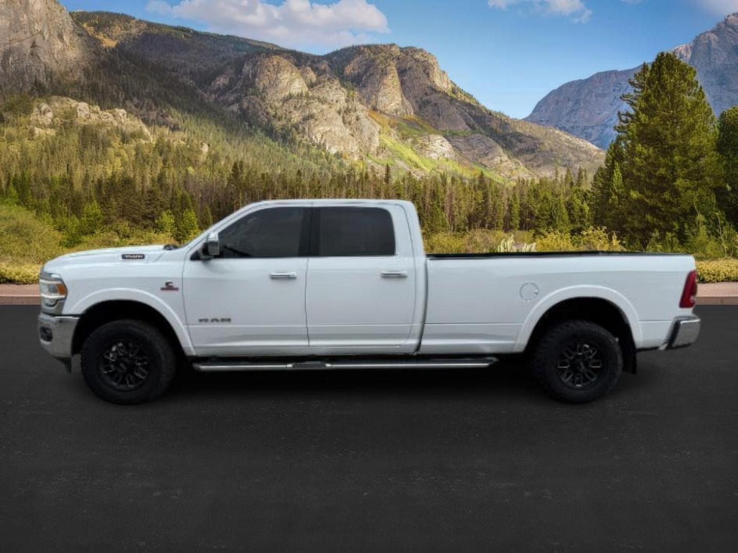 2020 Bright White Clearcoat /Black Ram 3500 (3C63R3JL8LG) with an Cummins High Output 67L I-6 diesel direct injecti engine, Automatic transmission, located at 1175 N Woodruff Ave, Idaho Falls, ID, 83401, 43.506901, -111.999657 - At Timberline Auto, finding a great deal on your next vehicle is always easy! Our experienced sales staff's goal is to help find you the right vehicle at the right price! Our knowledgeable finance department has options for almost any credit score. We offer extended service contract options to prote - Photo#1