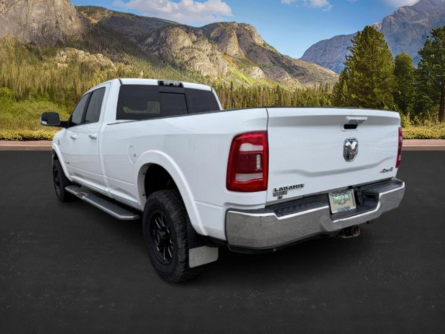 2020 Bright White Clearcoat /Black Ram 3500 (3C63R3JL8LG) with an Cummins High Output 67L I-6 diesel direct injecti engine, Automatic transmission, located at 1175 N Woodruff Ave, Idaho Falls, ID, 83401, 43.506901, -111.999657 - At Timberline Auto, finding a great deal on your next vehicle is always easy! Our experienced sales staff's goal is to help find you the right vehicle at the right price! Our knowledgeable finance department has options for almost any credit score. We offer extended service contract options to prote - Photo#2