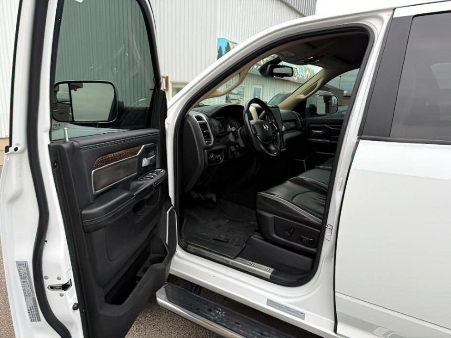 2020 Bright White Clearcoat /Black Ram 3500 (3C63R3JL8LG) with an Cummins High Output 67L I-6 diesel direct injecti engine, Automatic transmission, located at 1175 N Woodruff Ave, Idaho Falls, ID, 83401, 43.506901, -111.999657 - At Timberline Auto, finding a great deal on your next vehicle is always easy! Our experienced sales staff's goal is to help find you the right vehicle at the right price! Our knowledgeable finance department has options for almost any credit score. We offer extended service contract options to prote - Photo#11