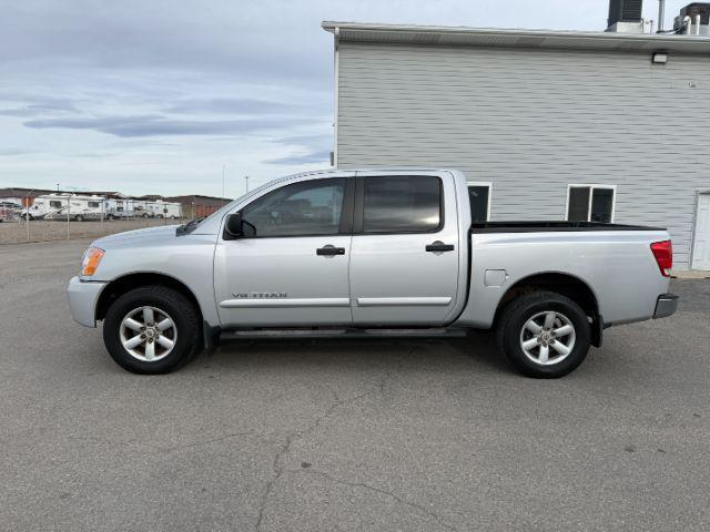 2012 SILVER /Charcoal Nissan Titan SV (1N6BA0EJ5CN) with an Endurance 5.6L V-8 DOHC engine, AUTOMATIC transmission, located at 1235 N Woodruff Ave., Idaho Falls, 83401, (208) 523-1053, 43.507172, -112.000488 - At Timberline Auto, finding a great deal on your next vehicle is always easy! Our experienced sales staff's goal is to help find you the right vehicle at the right price! Our knowledgeable finance department has options for almost any credit score. We offer extended service contract options to prote - Photo#21