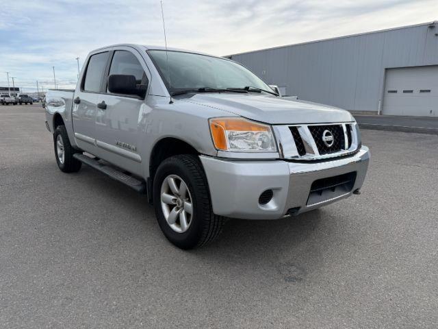 2012 SILVER /Charcoal Nissan Titan SV (1N6BA0EJ5CN) with an Endurance 5.6L V-8 DOHC engine, AUTOMATIC transmission, located at 1235 N Woodruff Ave., Idaho Falls, 83401, (208) 523-1053, 43.507172, -112.000488 - At Timberline Auto, finding a great deal on your next vehicle is always easy! Our experienced sales staff's goal is to help find you the right vehicle at the right price! Our knowledgeable finance department has options for almost any credit score. We offer extended service contract options to prote - Photo#26