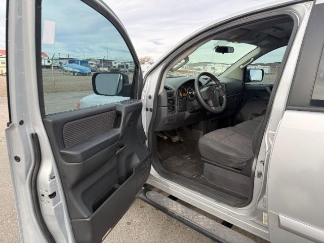 2012 SILVER /Charcoal Nissan Titan SV (1N6BA0EJ5CN) with an Endurance 5.6L V-8 DOHC engine, AUTOMATIC transmission, located at 1235 N Woodruff Ave., Idaho Falls, 83401, (208) 523-1053, 43.507172, -112.000488 - At Timberline Auto, finding a great deal on your next vehicle is always easy! Our experienced sales staff's goal is to help find you the right vehicle at the right price! Our knowledgeable finance department has options for almost any credit score. We offer extended service contract options to prote - Photo#29