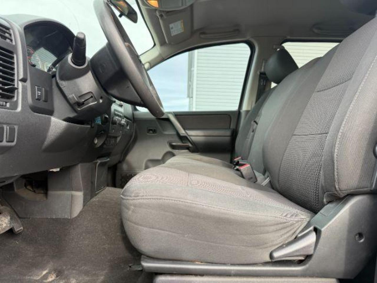 2012 SILVER /Charcoal Nissan Titan (1N6BA0EJ5CN) with an Endurance 56L V-8 DOHC engine, Automatic transmission, located at 1175 N Woodruff Ave, Idaho Falls, ID, 83401, 43.506901, -111.999657 - At Timberline Auto, finding a great deal on your next vehicle is always easy! Our experienced sales staff's goal is to help find you the right vehicle at the right price! Our knowledgeable finance department has options for almost any credit score. We offer extended service contract options to prote - Photo#30