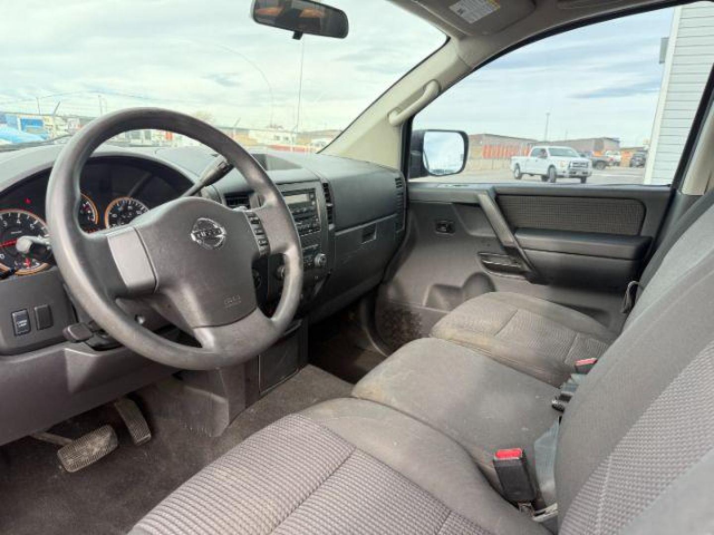 2012 SILVER /Charcoal Nissan Titan (1N6BA0EJ5CN) with an Endurance 56L V-8 DOHC engine, Automatic transmission, located at 1175 N Woodruff Ave, Idaho Falls, ID, 83401, 43.506901, -111.999657 - At Timberline Auto, finding a great deal on your next vehicle is always easy! Our experienced sales staff's goal is to help find you the right vehicle at the right price! Our knowledgeable finance department has options for almost any credit score. We offer extended service contract options to prote - Photo#31