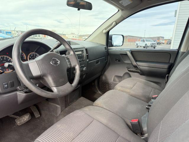 2012 SILVER /Charcoal Nissan Titan SV (1N6BA0EJ5CN) with an Endurance 5.6L V-8 DOHC engine, AUTOMATIC transmission, located at 1235 N Woodruff Ave., Idaho Falls, 83401, (208) 523-1053, 43.507172, -112.000488 - At Timberline Auto, finding a great deal on your next vehicle is always easy! Our experienced sales staff's goal is to help find you the right vehicle at the right price! Our knowledgeable finance department has options for almost any credit score. We offer extended service contract options to prote - Photo#31