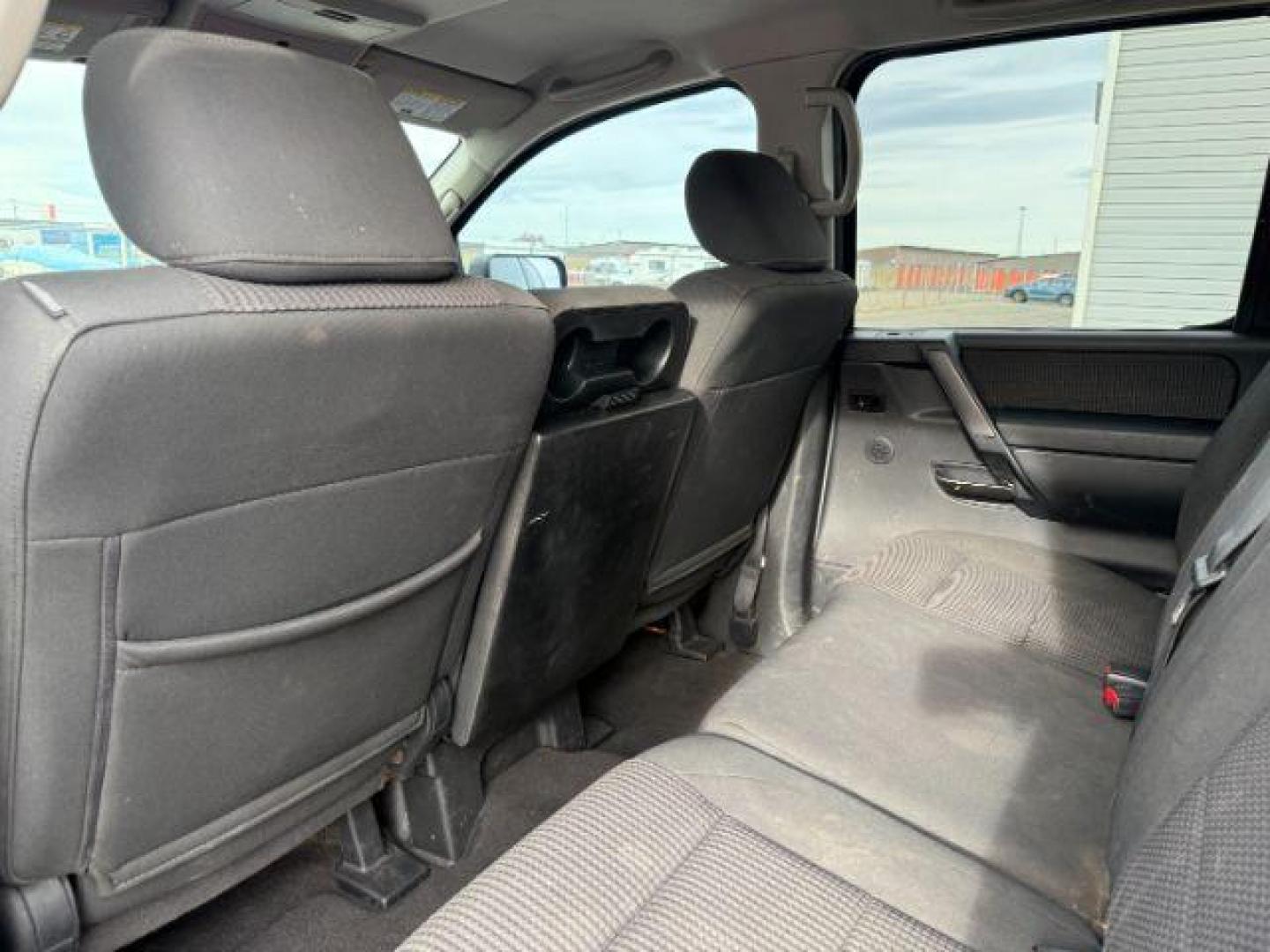 2012 SILVER /Charcoal Nissan Titan (1N6BA0EJ5CN) with an Endurance 56L V-8 DOHC engine, Automatic transmission, located at 1175 N Woodruff Ave, Idaho Falls, ID, 83401, 43.506901, -111.999657 - At Timberline Auto, finding a great deal on your next vehicle is always easy! Our experienced sales staff's goal is to help find you the right vehicle at the right price! Our knowledgeable finance department has options for almost any credit score. We offer extended service contract options to prote - Photo#38