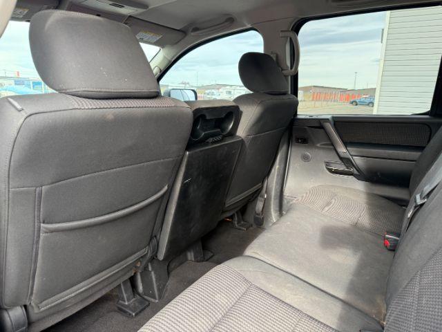 2012 SILVER /Charcoal Nissan Titan SV (1N6BA0EJ5CN) with an Endurance 5.6L V-8 DOHC engine, AUTOMATIC transmission, located at 1235 N Woodruff Ave., Idaho Falls, 83401, (208) 523-1053, 43.507172, -112.000488 - At Timberline Auto, finding a great deal on your next vehicle is always easy! Our experienced sales staff's goal is to help find you the right vehicle at the right price! Our knowledgeable finance department has options for almost any credit score. We offer extended service contract options to prote - Photo#38