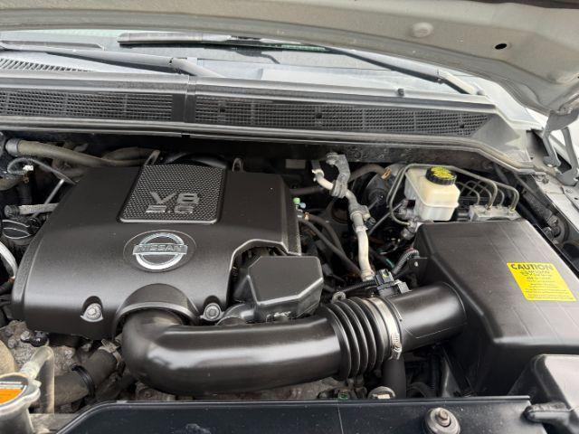 2012 SILVER /Charcoal Nissan Titan SV (1N6BA0EJ5CN) with an Endurance 5.6L V-8 DOHC engine, AUTOMATIC transmission, located at 1235 N Woodruff Ave., Idaho Falls, 83401, (208) 523-1053, 43.507172, -112.000488 - At Timberline Auto, finding a great deal on your next vehicle is always easy! Our experienced sales staff's goal is to help find you the right vehicle at the right price! Our knowledgeable finance department has options for almost any credit score. We offer extended service contract options to prote - Photo#39
