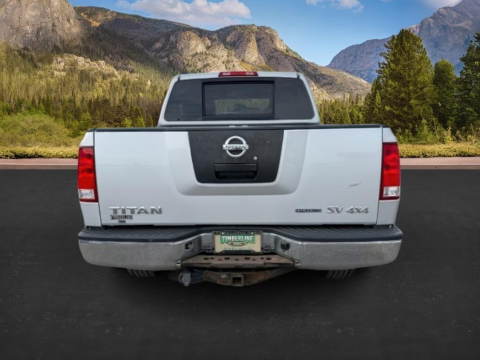2012 SILVER /Charcoal Nissan Titan SV (1N6BA0EJ5CN) with an Endurance 5.6L V-8 DOHC engine, AUTOMATIC transmission, located at 1235 N Woodruff Ave., Idaho Falls, 83401, (208) 523-1053, 43.507172, -112.000488 - At Timberline Auto, finding a great deal on your next vehicle is always easy! Our experienced sales staff's goal is to help find you the right vehicle at the right price! Our knowledgeable finance department has options for almost any credit score. We offer extended service contract options to prote - Photo#3