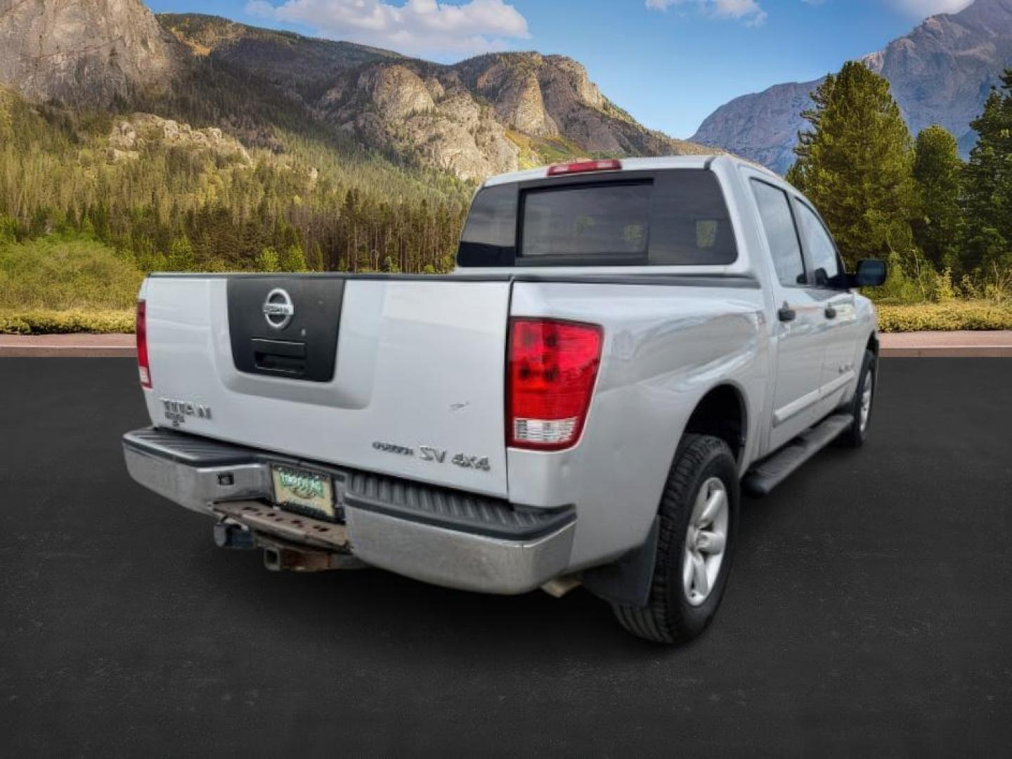 2012 SILVER /Charcoal Nissan Titan (1N6BA0EJ5CN) with an Endurance 56L V-8 DOHC engine, Automatic transmission, located at 1175 N Woodruff Ave, Idaho Falls, ID, 83401, 43.506901, -111.999657 - At Timberline Auto, finding a great deal on your next vehicle is always easy! Our experienced sales staff's goal is to help find you the right vehicle at the right price! Our knowledgeable finance department has options for almost any credit score. We offer extended service contract options to prote - Photo#4