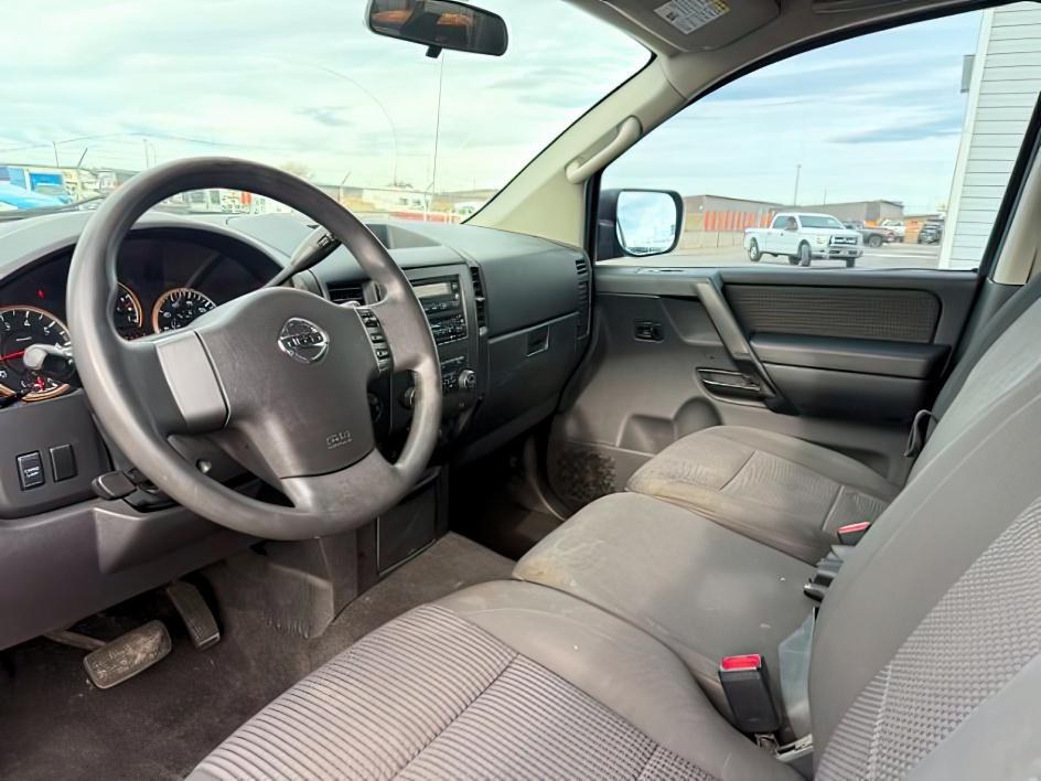 2012 SILVER /Charcoal Nissan Titan SV (1N6BA0EJ5CN) with an Endurance 5.6L V-8 DOHC engine, AUTOMATIC transmission, located at 1235 N Woodruff Ave., Idaho Falls, 83401, (208) 523-1053, 43.507172, -112.000488 - At Timberline Auto, finding a great deal on your next vehicle is always easy! Our experienced sales staff's goal is to help find you the right vehicle at the right price! Our knowledgeable finance department has options for almost any credit score. We offer extended service contract options to prote - Photo#11