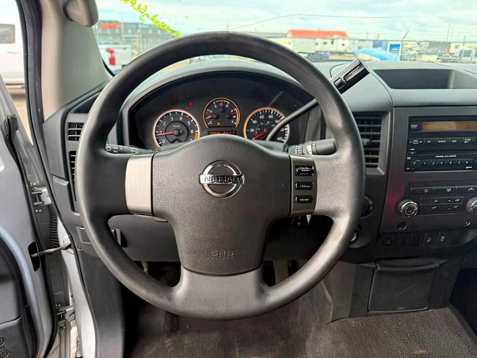 2012 SILVER /Charcoal Nissan Titan SV (1N6BA0EJ5CN) with an Endurance 5.6L V-8 DOHC engine, AUTOMATIC transmission, located at 1235 N Woodruff Ave., Idaho Falls, 83401, (208) 523-1053, 43.507172, -112.000488 - At Timberline Auto, finding a great deal on your next vehicle is always easy! Our experienced sales staff's goal is to help find you the right vehicle at the right price! Our knowledgeable finance department has options for almost any credit score. We offer extended service contract options to prote - Photo#12