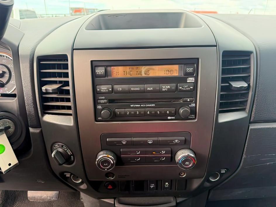 2012 SILVER /Charcoal Nissan Titan SV (1N6BA0EJ5CN) with an Endurance 5.6L V-8 DOHC engine, AUTOMATIC transmission, located at 1235 N Woodruff Ave., Idaho Falls, 83401, (208) 523-1053, 43.507172, -112.000488 - At Timberline Auto, finding a great deal on your next vehicle is always easy! Our experienced sales staff's goal is to help find you the right vehicle at the right price! Our knowledgeable finance department has options for almost any credit score. We offer extended service contract options to prote - Photo#13