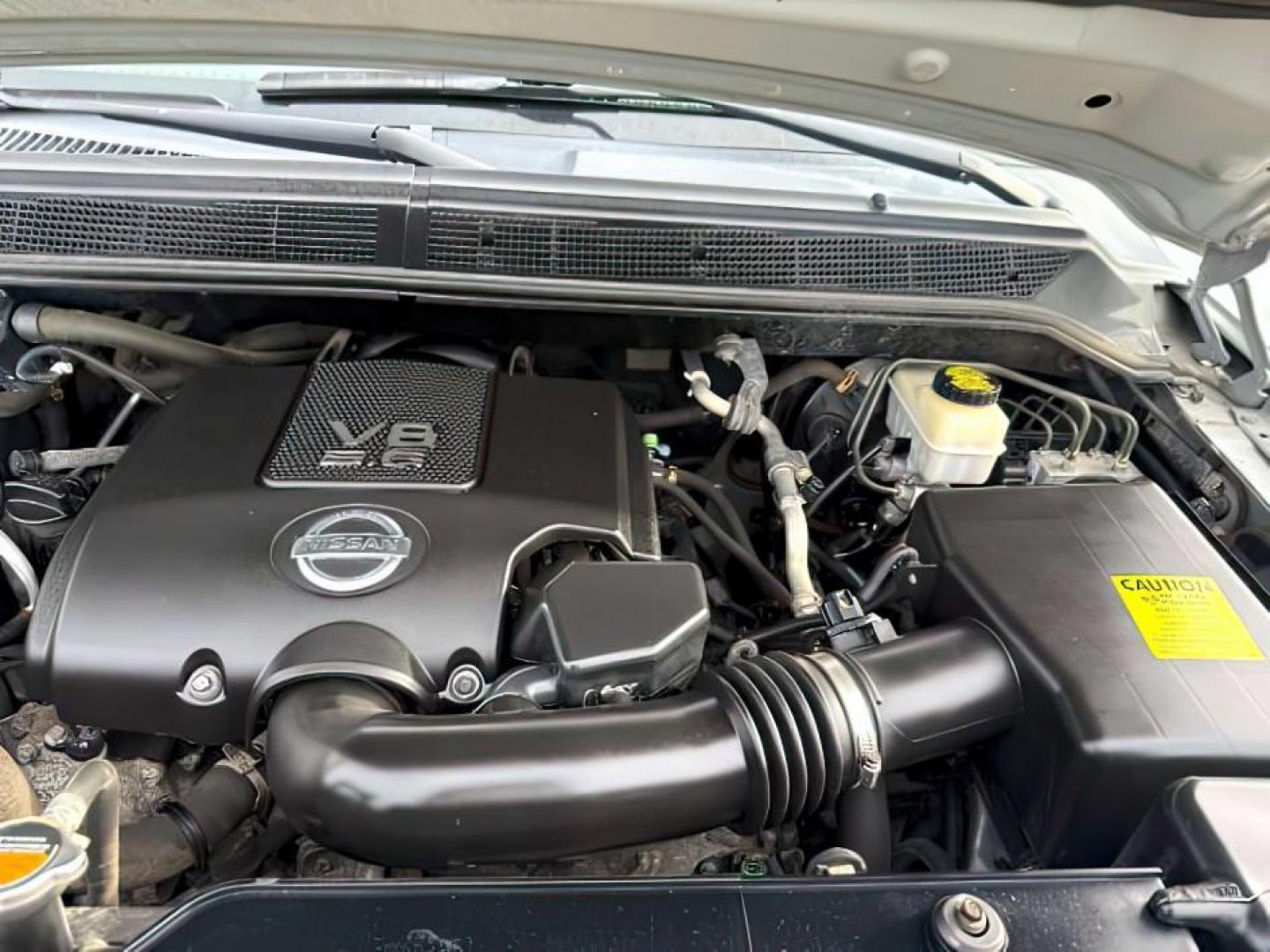 2012 SILVER /Charcoal Nissan Titan (1N6BA0EJ5CN) with an Endurance 56L V-8 DOHC engine, Automatic transmission, located at 1175 N Woodruff Ave, Idaho Falls, ID, 83401, 43.506901, -111.999657 - At Timberline Auto, finding a great deal on your next vehicle is always easy! Our experienced sales staff's goal is to help find you the right vehicle at the right price! Our knowledgeable finance department has options for almost any credit score. We offer extended service contract options to prote - Photo#19