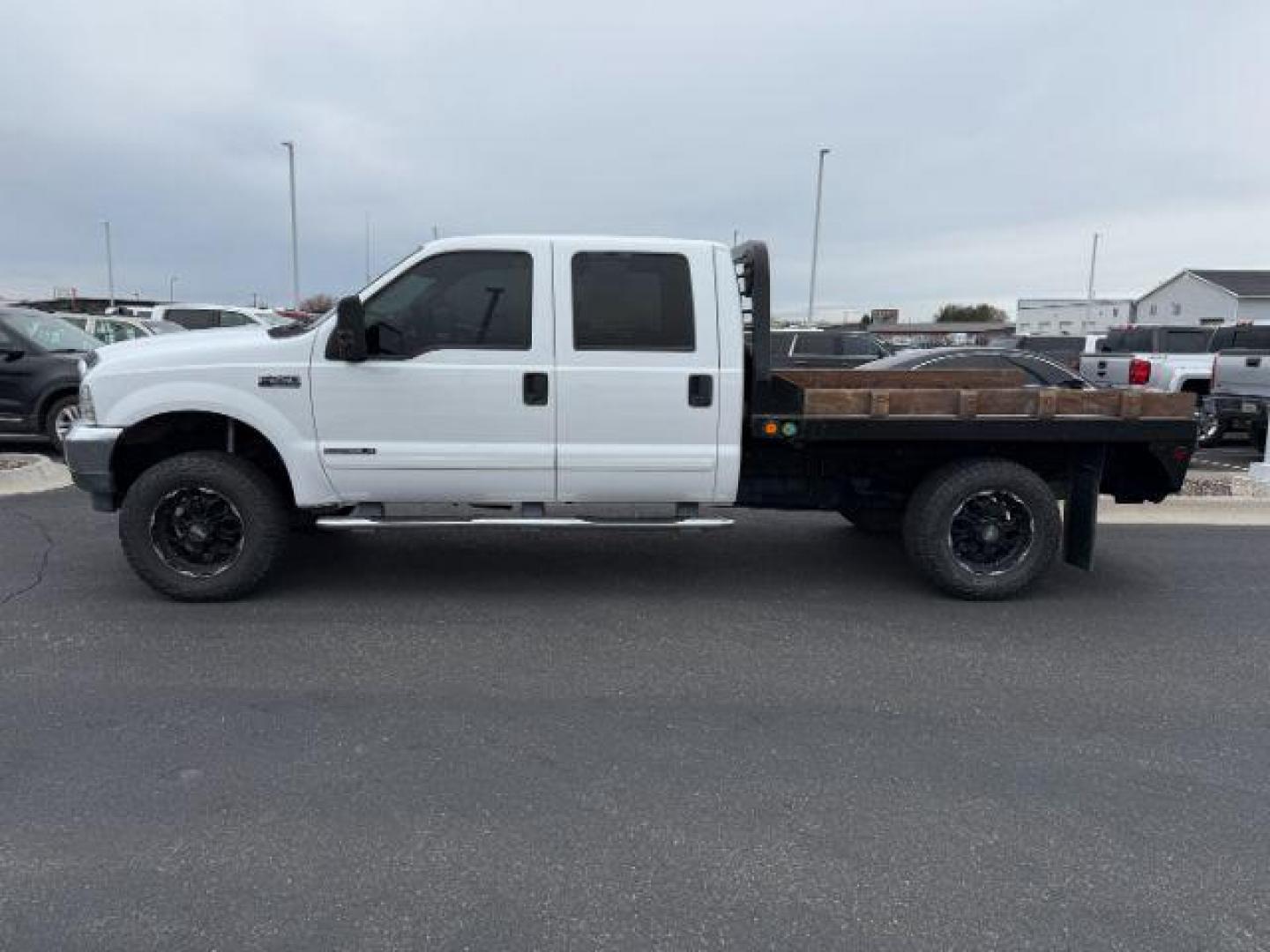 2002 WHITE /Medium Flint Ford F-250 (1FTNW21F82E) with an Powerstroke 73L V-8 diesel direct injection engine, Automatic transmission, located at 1175 N Woodruff Ave, Idaho Falls, ID, 83401, 43.506901, -111.999657 - At Timberline Auto, finding a great deal on your next vehicle is always easy! Our experienced sales staff's goal is to help find you the right vehicle at the right price! Our knowledgeable finance department has options for almost any credit score. We offer extended service contract options to prote - Photo#1