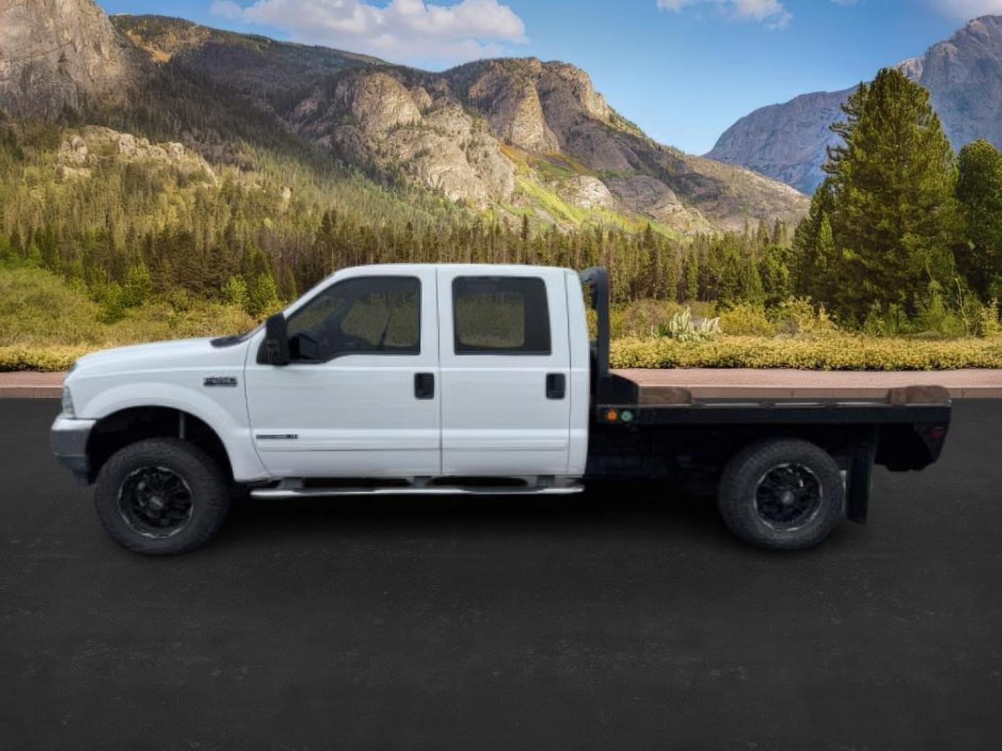 2002 WHITE /Medium Flint Ford F-250 (1FTNW21F82E) with an Powerstroke 73L V-8 diesel direct injection engine, Automatic transmission, located at 1175 N Woodruff Ave, Idaho Falls, ID, 83401, 43.506901, -111.999657 - At Timberline Auto, finding a great deal on your next vehicle is always easy! Our experienced sales staff's goal is to help find you the right vehicle at the right price! Our knowledgeable finance department has options for almost any credit score. We offer extended service contract options to prote - Photo#0