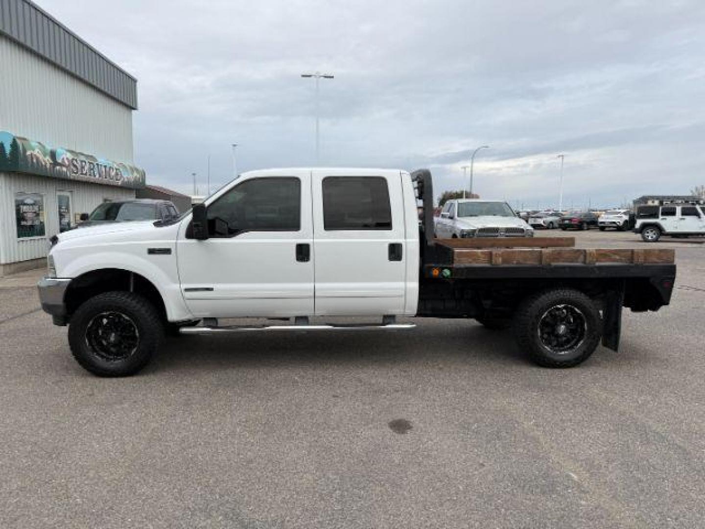 2002 WHITE /Medium Flint Ford F-250 (1FTNW21F82E) with an Powerstroke 73L V-8 diesel direct injection engine, Automatic transmission, located at 1175 N Woodruff Ave, Idaho Falls, ID, 83401, 43.506901, -111.999657 - At Timberline Auto, finding a great deal on your next vehicle is always easy! Our experienced sales staff's goal is to help find you the right vehicle at the right price! Our knowledgeable finance department has options for almost any credit score. We offer extended service contract options to prote - Photo#21