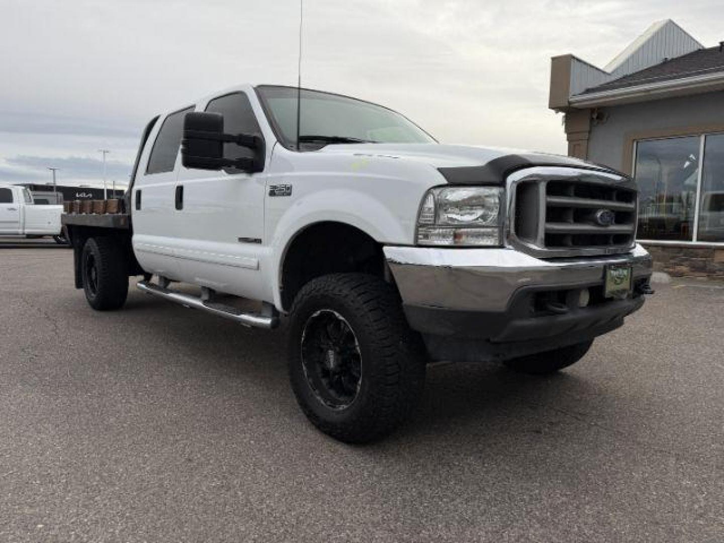 2002 WHITE /Medium Flint Ford F-250 (1FTNW21F82E) with an Powerstroke 73L V-8 diesel direct injection engine, Automatic transmission, located at 1175 N Woodruff Ave, Idaho Falls, ID, 83401, 43.506901, -111.999657 - At Timberline Auto, finding a great deal on your next vehicle is always easy! Our experienced sales staff's goal is to help find you the right vehicle at the right price! Our knowledgeable finance department has options for almost any credit score. We offer extended service contract options to prote - Photo#26