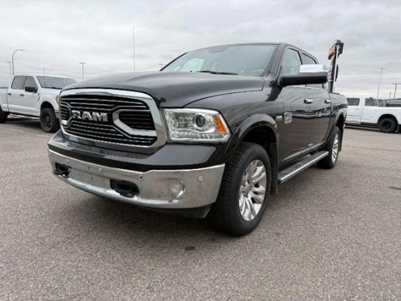 2017 Brilliant Black Crystal Pearl /LEATHER Ram 1500 Longhorn (1C6RR7PT4HS) with an V8, 5.7L engine, 8-speed automatic transmission, located at 1175 N Woodruff Ave, Idaho Falls, ID, 83401, 43.506901, -111.999657 - <b>Vehicle Details</b><br>Experience refined capability and premium comfort in this pre-owned 2017 Ram 1500 Laramie Longhorn, now available in Idaho Falls, ID. Powered by a proven V8, 5.7L gasoline engine and equipped with 4WD, this Ram 1500 delivers confident performance for towing, hauling, and ev- Photo#0