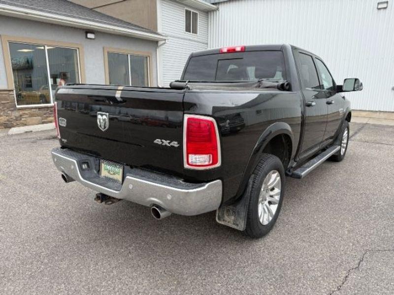 2017 Brilliant Black Crystal Pearl /LEATHER Ram 1500 Longhorn (1C6RR7PT4HS) with an V8, 5.7L engine, 8-speed automatic transmission, located at 1175 N Woodruff Ave, Idaho Falls, ID, 83401, 43.506901, -111.999657 - <b>Vehicle Details</b><br>Experience refined capability and premium comfort in this pre-owned 2017 Ram 1500 Laramie Longhorn, now available in Idaho Falls, ID. Powered by a proven V8, 5.7L gasoline engine and equipped with 4WD, this Ram 1500 delivers confident performance for towing, hauling, and ev- Photo#5