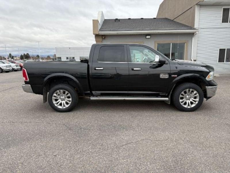 2017 Brilliant Black Crystal Pearl /LEATHER Ram 1500 Longhorn (1C6RR7PT4HS) with an V8, 5.7L engine, 8-speed automatic transmission, located at 1175 N Woodruff Ave, Idaho Falls, ID, 83401, 43.506901, -111.999657 - <b>Vehicle Details</b><br>Experience refined capability and premium comfort in this pre-owned 2017 Ram 1500 Laramie Longhorn, now available in Idaho Falls, ID. Powered by a proven V8, 5.7L gasoline engine and equipped with 4WD, this Ram 1500 delivers confident performance for towing, hauling, and ev- Photo#6
