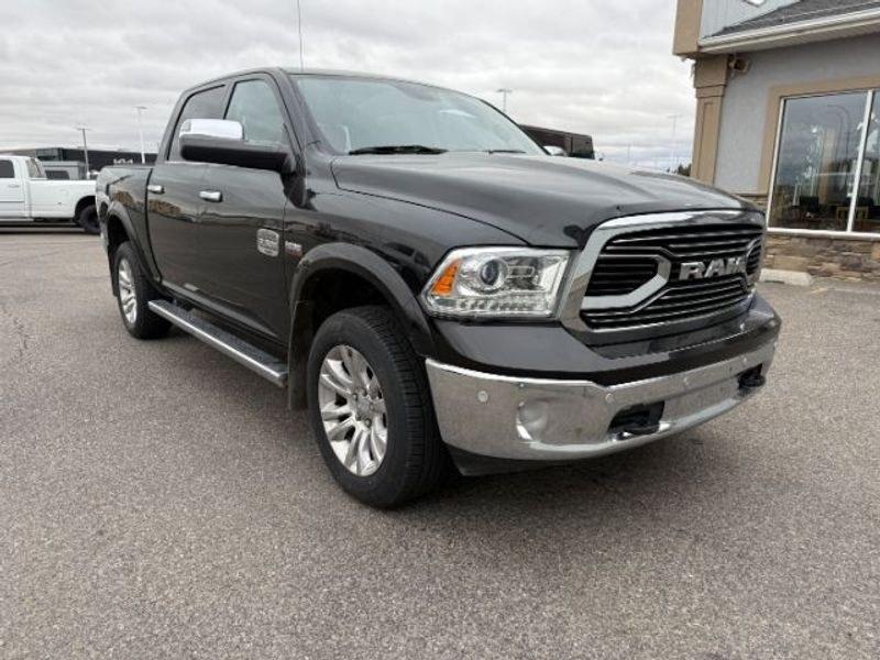 2017 Brilliant Black Crystal Pearl /LEATHER Ram 1500 Longhorn (1C6RR7PT4HS) with an V8, 5.7L engine, 8-speed automatic transmission, located at 1175 N Woodruff Ave, Idaho Falls, ID, 83401, 43.506901, -111.999657 - <b>Vehicle Details</b><br>Experience refined capability and premium comfort in this pre-owned 2017 Ram 1500 Laramie Longhorn, now available in Idaho Falls, ID. Powered by a proven V8, 5.7L gasoline engine and equipped with 4WD, this Ram 1500 delivers confident performance for towing, hauling, and ev- Photo#7