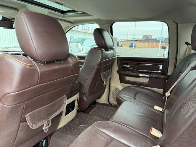 2017 Brilliant Black Crystal Pearl /LEATHER Ram 1500 Longhorn (1C6RR7PT4HS) with an V8, 5.7L engine, 8-speed automatic transmission, located at 1175 N Woodruff Ave, Idaho Falls, ID, 83401, 43.506901, -111.999657 - <b>Vehicle Details</b><br>Experience refined capability and premium comfort in this pre-owned 2017 Ram 1500 Laramie Longhorn, now available in Idaho Falls, ID. Powered by a proven V8, 5.7L gasoline engine and equipped with 4WD, this Ram 1500 delivers confident performance for towing, hauling, and ev- Photo#23
