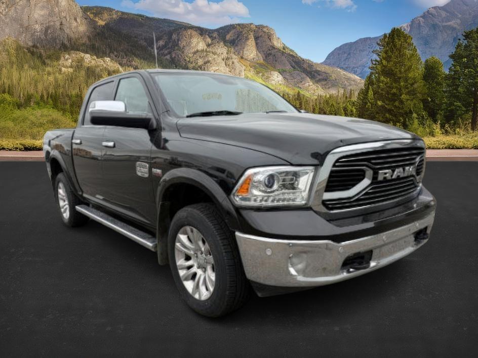 2017 BLACK /LEATHER Ram 1500 (1C6RR7PT4HS) with an 57 engine, Automatic transmission, located at 1175 N Woodruff Ave, Idaho Falls, ID, 83401, 43.506901, -111.999657 - This 2017 Ram 1500 combines full-size truck capability with comfort features that make it easy to use every day. Powered by a 5.7L HEMI V8 and equipped with 4x4, it delivers strong towing and hauling performance while handling changing road conditions with confidence. Inside, the leather interior ad- Photo#7
