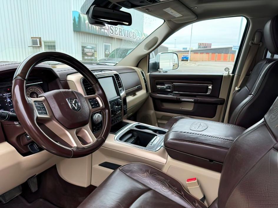 2017 BLACK /LEATHER Ram 1500 (1C6RR7PT4HS) with an 57 engine, Automatic transmission, located at 1175 N Woodruff Ave, Idaho Falls, ID, 83401, 43.506901, -111.999657 - This 2017 Ram 1500 combines full-size truck capability with comfort features that make it easy to use every day. Powered by a 5.7L HEMI V8 and equipped with 4x4, it delivers strong towing and hauling performance while handling changing road conditions with confidence. Inside, the leather interior ad- Photo#12