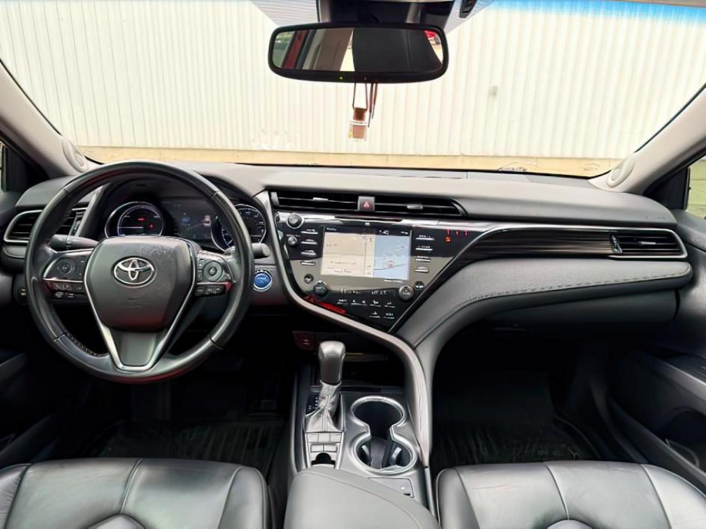 2019 RED /Black Toyota Camry Hybrid (4T1B21HK3KU) with an Dynamic Force 25L I-4 portdirect injection engine, Automatic transmission, located at 1175 N Woodruff Ave, Idaho Falls, ID, 83401, 43.506901, -111.999657 - At Timberline Auto, finding a great deal on your next vehicle is always easy! Our experienced sales staff's goal is to help find you the right vehicle at the right price! Our knowledgeable finance department has options for almost any credit score. We offer extended service contract options to prote - Photo#22