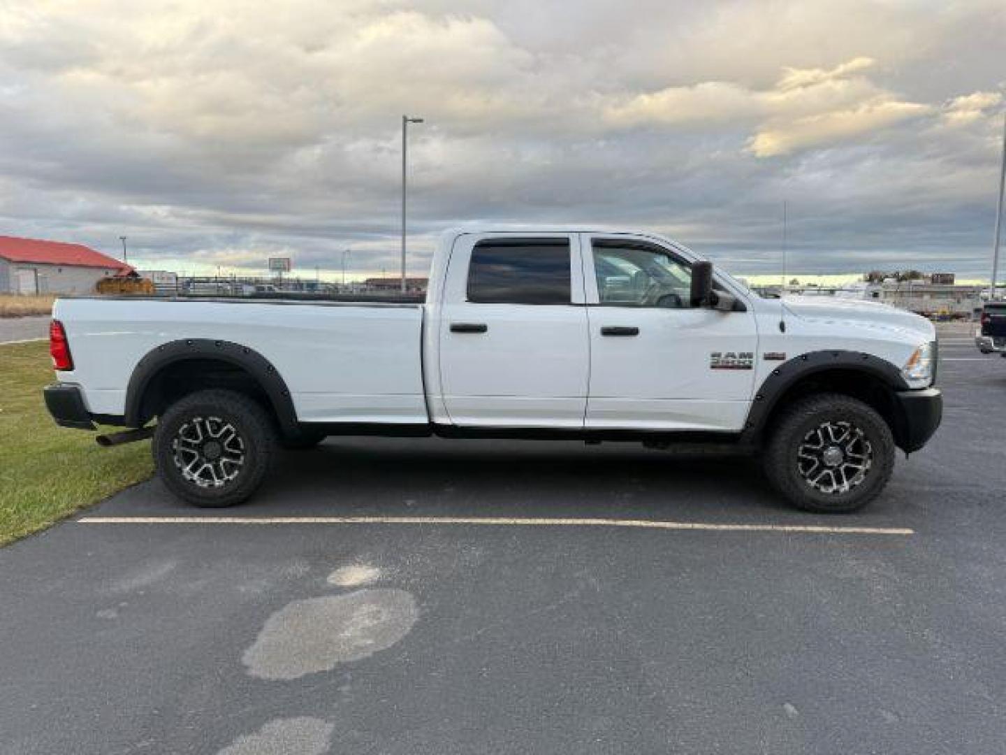 2016 Bright White Clearcoat /Diesel Gray/Black Ram 3500 (3C63R3GJ2GG) with an HEMI 64L V-8 VVT variable valve control engine, Automatic transmission, located at 1175 N Woodruff Ave, Idaho Falls, ID, 83401, 43.506901, -111.999657 - At Timberline Auto, finding a great deal on your next vehicle is always easy! Our experienced sales staff's goal is to help find you the right vehicle at the right price! Our knowledgeable finance department has options for almost any credit score. We offer extended service contract options to prote - Photo#1