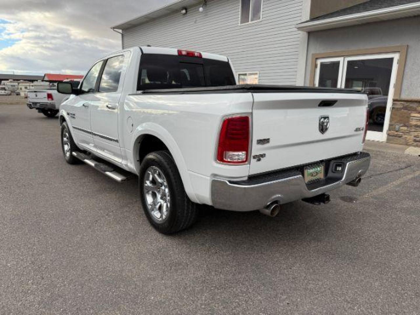 2013 WHITE /LEATHER Ram 1500 LIMITED (1C6RR7NT9DS) with an 5.7 engine, AUTOMATIC transmission, located at 1235 N Woodruff Ave., Idaho Falls, 83401, (208) 523-1053, 43.507172, -112.000488 - At Timberline Auto, finding a great deal on your next vehicle is always easy! Our experienced sales staff's goal is to help find you the right vehicle at the right price! Our knowledgeable finance department has options for almost any credit score. We offer extended service contract options to prote - Photo#2