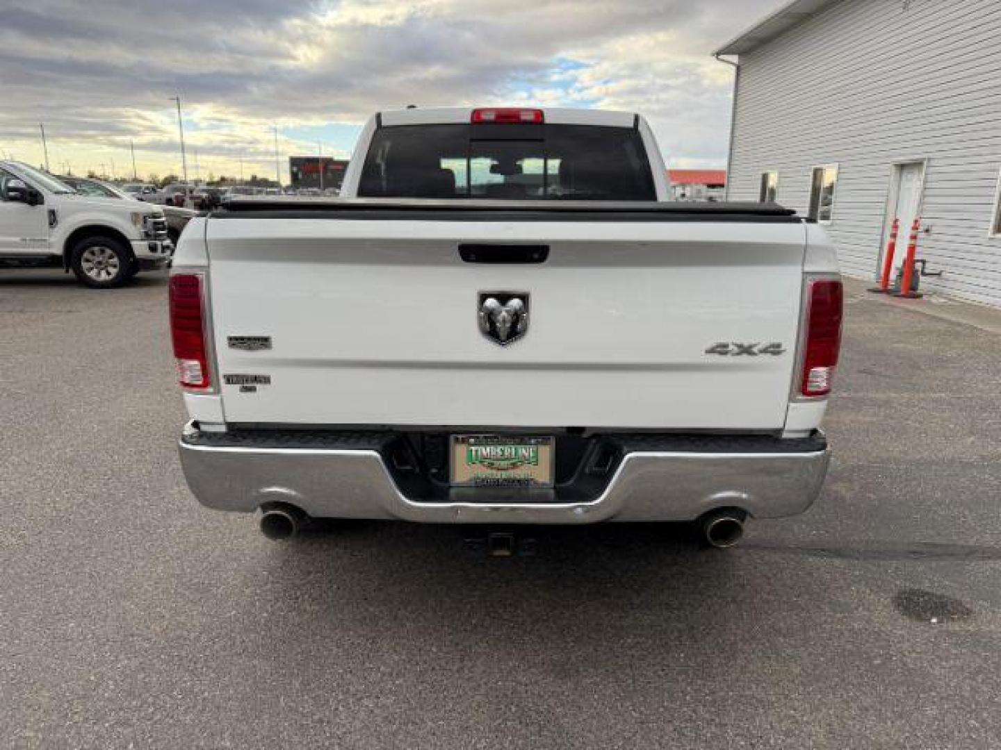 2013 WHITE /LEATHER Ram 1500 LIMITED (1C6RR7NT9DS) with an 5.7 engine, AUTOMATIC transmission, located at 1235 N Woodruff Ave., Idaho Falls, 83401, (208) 523-1053, 43.507172, -112.000488 - At Timberline Auto, finding a great deal on your next vehicle is always easy! Our experienced sales staff's goal is to help find you the right vehicle at the right price! Our knowledgeable finance department has options for almost any credit score. We offer extended service contract options to prote - Photo#3