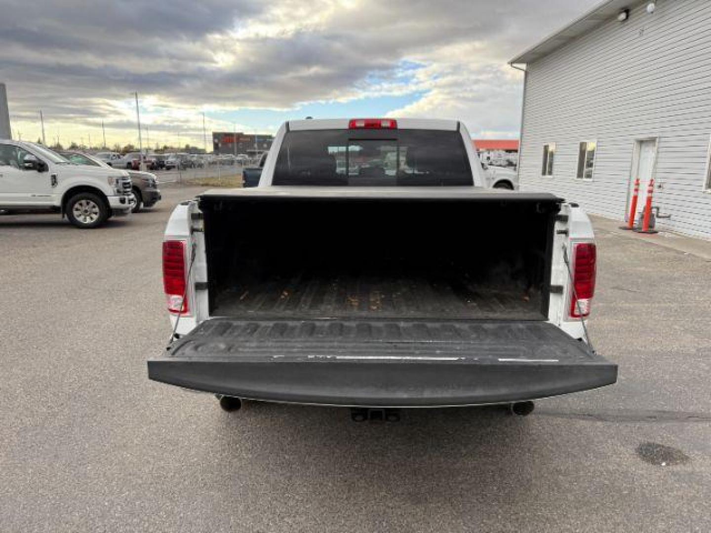 2013 WHITE /LEATHER Ram 1500 LIMITED (1C6RR7NT9DS) with an 5.7 engine, AUTOMATIC transmission, located at 1235 N Woodruff Ave., Idaho Falls, 83401, (208) 523-1053, 43.507172, -112.000488 - At Timberline Auto, finding a great deal on your next vehicle is always easy! Our experienced sales staff's goal is to help find you the right vehicle at the right price! Our knowledgeable finance department has options for almost any credit score. We offer extended service contract options to prote - Photo#5