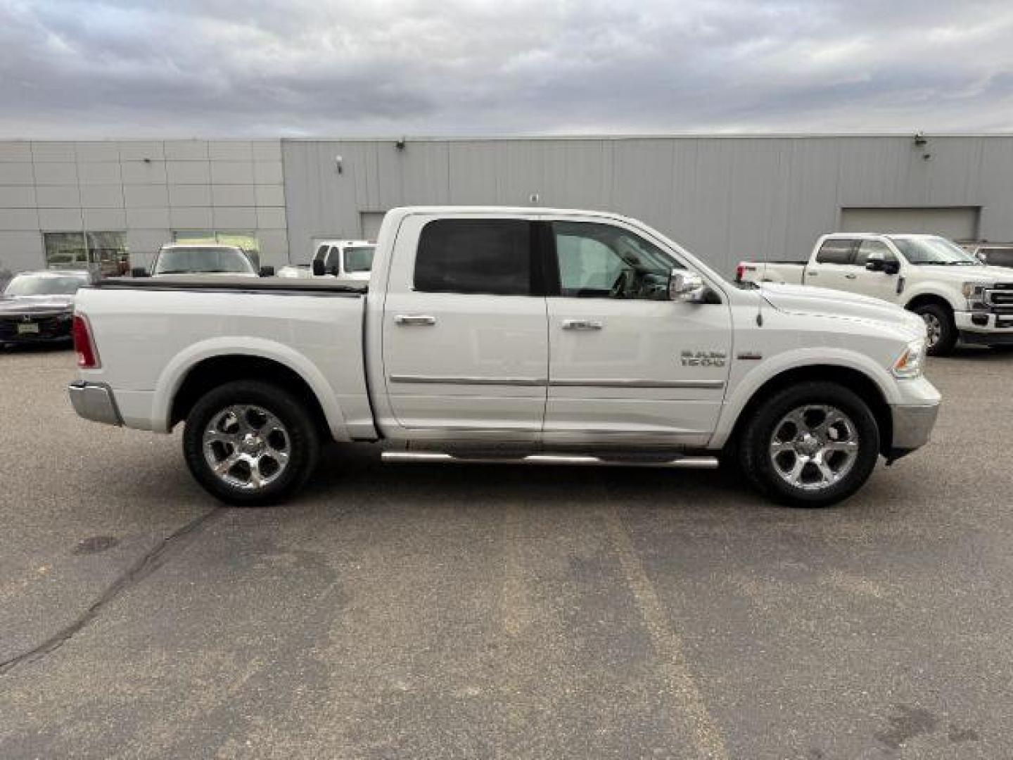 2013 WHITE /LEATHER Ram 1500 LIMITED (1C6RR7NT9DS) with an 5.7 engine, AUTOMATIC transmission, located at 1235 N Woodruff Ave., Idaho Falls, 83401, (208) 523-1053, 43.507172, -112.000488 - At Timberline Auto, finding a great deal on your next vehicle is always easy! Our experienced sales staff's goal is to help find you the right vehicle at the right price! Our knowledgeable finance department has options for almost any credit score. We offer extended service contract options to prote - Photo#7
