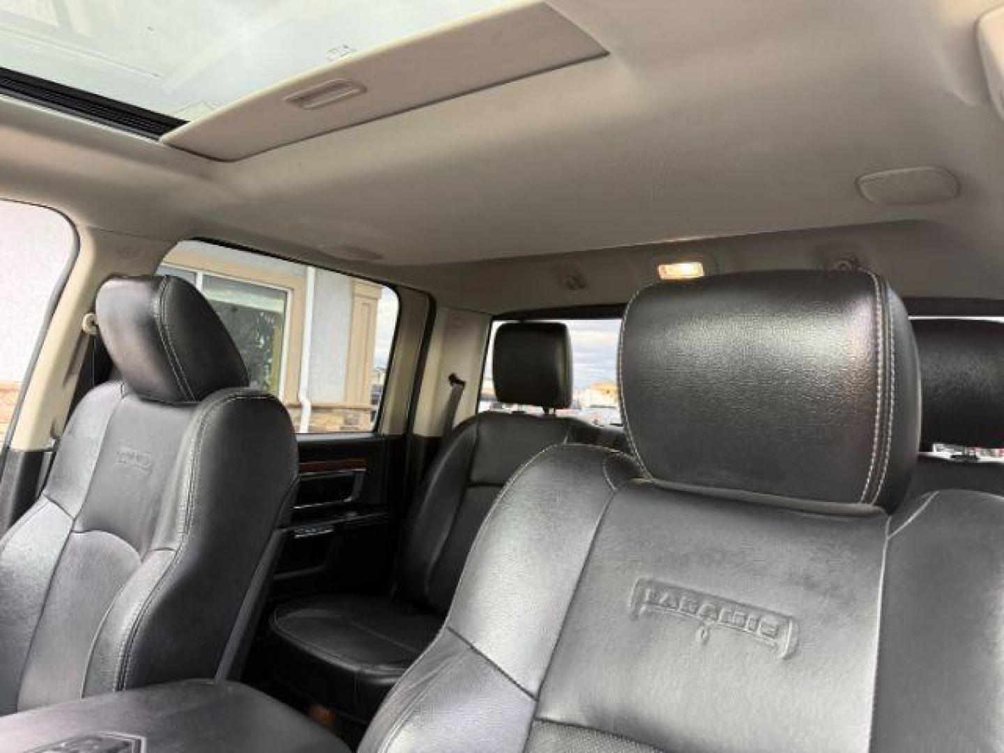 2013 WHITE /LEATHER Ram 1500 LIMITED (1C6RR7NT9DS) with an 5.7 engine, AUTOMATIC transmission, located at 1235 N Woodruff Ave., Idaho Falls, 83401, (208) 523-1053, 43.507172, -112.000488 - At Timberline Auto, finding a great deal on your next vehicle is always easy! Our experienced sales staff's goal is to help find you the right vehicle at the right price! Our knowledgeable finance department has options for almost any credit score. We offer extended service contract options to prote - Photo#20