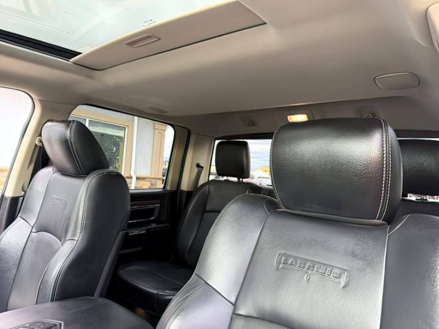 2013 WHITE /LEATHER Ram 1500 (1C6RR7NT9DS) with an 57 engine, Automatic transmission, located at 1175 N Woodruff Ave, Idaho Falls, ID, 83401, 43.506901, -111.999657 - At Timberline Auto, finding a great deal on your next vehicle is always easy! Our experienced sales staff's goal is to help find you the right vehicle at the right price! Our knowledgeable finance department has options for almost any credit score. We offer extended service contract options to prote - Photo#20