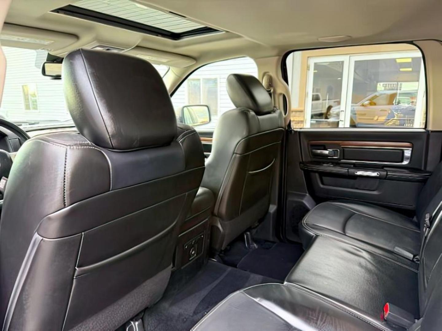 2013 WHITE /LEATHER Ram 1500 (1C6RR7NT9DS) with an 57 engine, Automatic transmission, located at 1175 N Woodruff Ave, Idaho Falls, ID, 83401, 43.506901, -111.999657 - At Timberline Auto, finding a great deal on your next vehicle is always easy! Our experienced sales staff's goal is to help find you the right vehicle at the right price! Our knowledgeable finance department has options for almost any credit score. We offer extended service contract options to prote - Photo#24