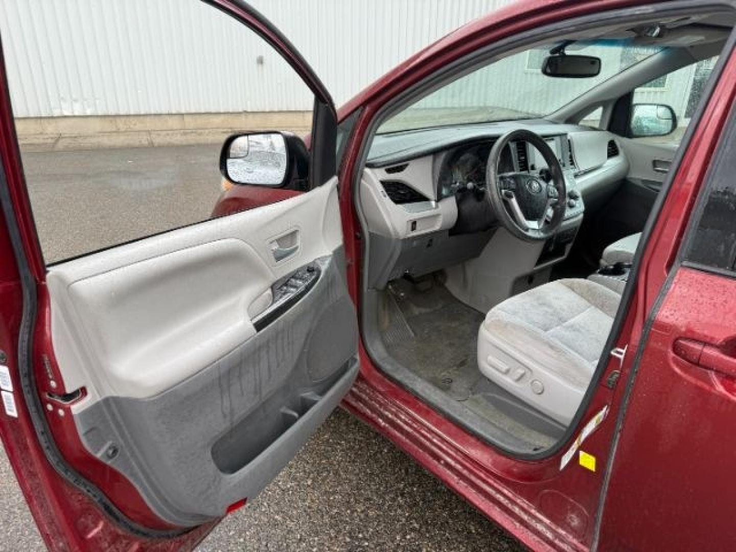 2015 Salsa Red Pearl /Ash Toyota Sienna (5TDKK3DC4FS) with an 35L V-6 DOHC engine, Automatic transmission, located at 1175 N Woodruff Ave, Idaho Falls, ID, 83401, 43.506901, -111.999657 - At Timberline Auto, finding a great deal on your next vehicle is always easy! Our experienced sales staff's goal is to help find you the right vehicle at the right price! Our knowledgeable finance department has options for almost any credit score. We offer extended service contract options to prote - Photo#37