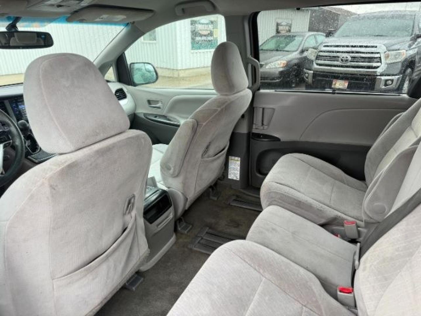 2015 Salsa Red Pearl /Ash Toyota Sienna (5TDKK3DC4FS) with an 35L V-6 DOHC engine, Automatic transmission, located at 1175 N Woodruff Ave, Idaho Falls, ID, 83401, 43.506901, -111.999657 - At Timberline Auto, finding a great deal on your next vehicle is always easy! Our experienced sales staff's goal is to help find you the right vehicle at the right price! Our knowledgeable finance department has options for almost any credit score. We offer extended service contract options to prote - Photo#48