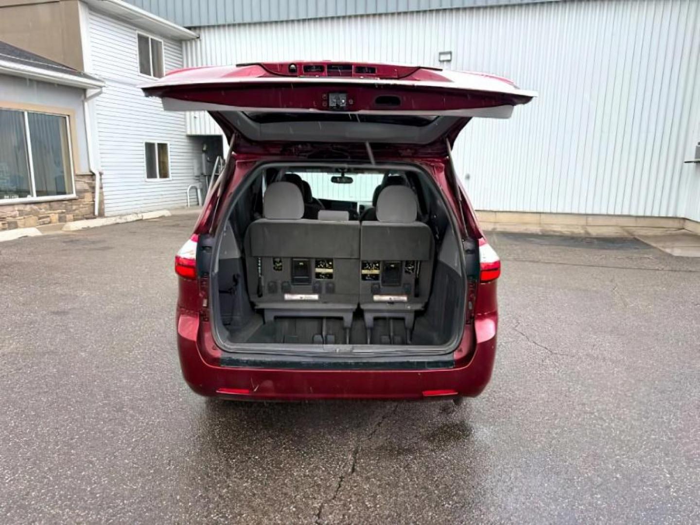 2015 Salsa Red Pearl /Ash Toyota Sienna (5TDKK3DC4FS) with an 35L V-6 DOHC engine, Automatic transmission, located at 1175 N Woodruff Ave, Idaho Falls, ID, 83401, 43.506901, -111.999657 - At Timberline Auto, finding a great deal on your next vehicle is always easy! Our experienced sales staff's goal is to help find you the right vehicle at the right price! Our knowledgeable finance department has options for almost any credit score. We offer extended service contract options to prote - Photo#5