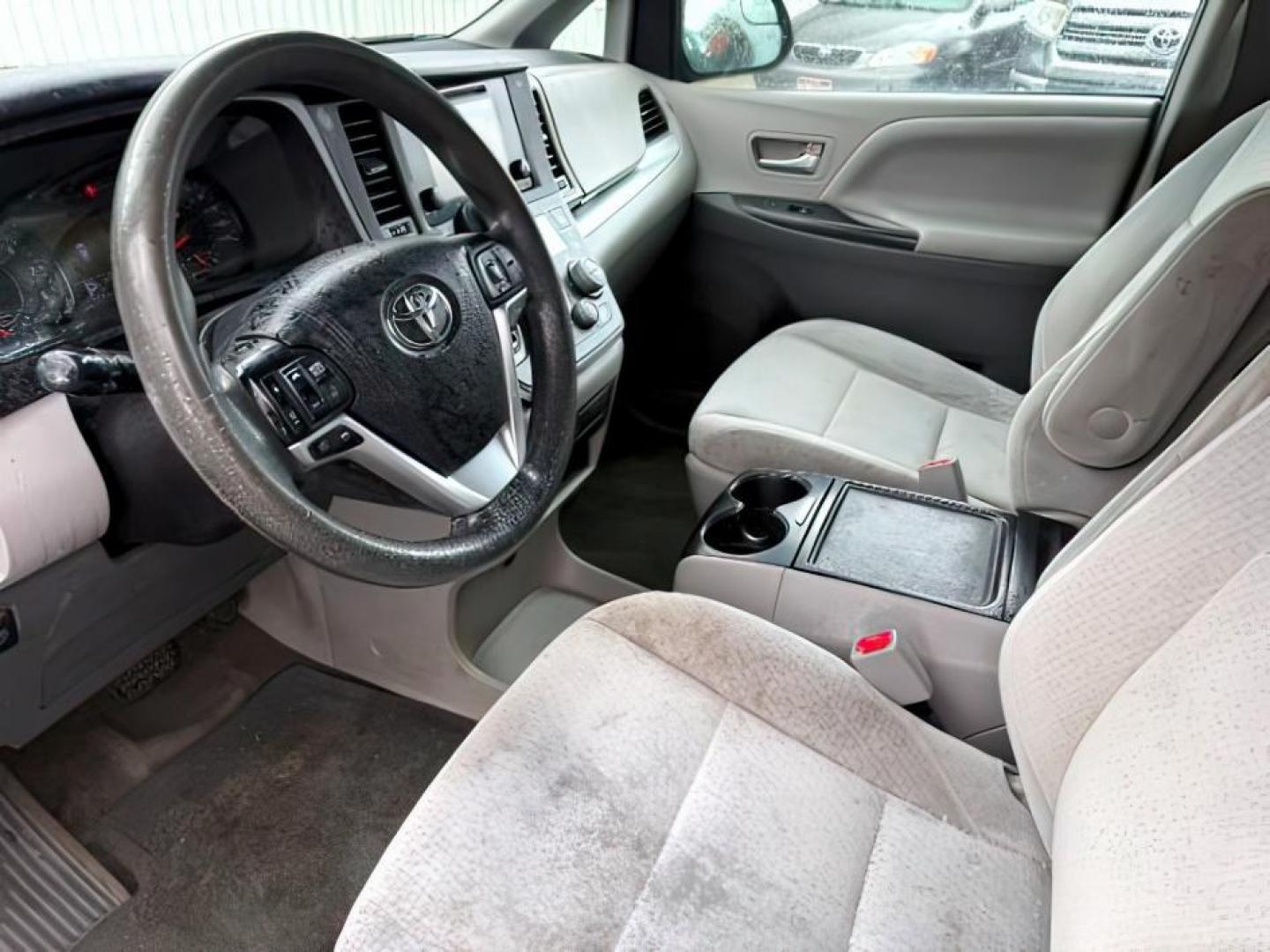 2015 Salsa Red Pearl /Ash Toyota Sienna (5TDKK3DC4FS) with an 35L V-6 DOHC engine, Automatic transmission, located at 1175 N Woodruff Ave, Idaho Falls, ID, 83401, 43.506901, -111.999657 - At Timberline Auto, finding a great deal on your next vehicle is always easy! Our experienced sales staff's goal is to help find you the right vehicle at the right price! Our knowledgeable finance department has options for almost any credit score. We offer extended service contract options to prote - Photo#14