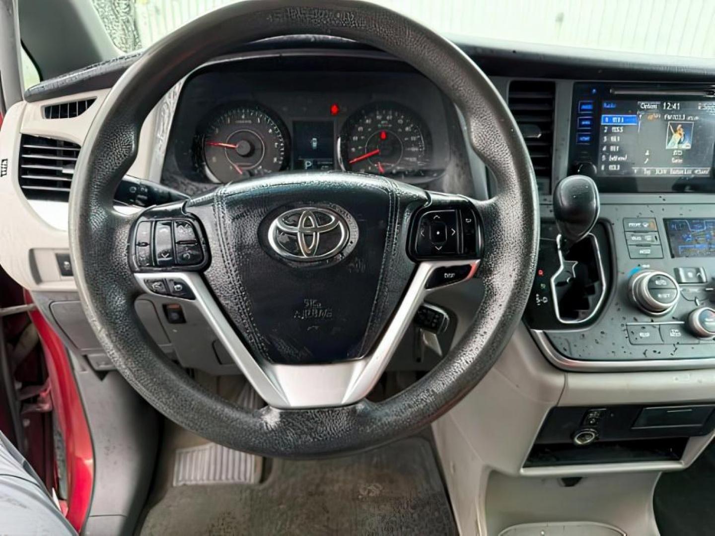 2015 Salsa Red Pearl /Ash Toyota Sienna (5TDKK3DC4FS) with an 35L V-6 DOHC engine, Automatic transmission, located at 1175 N Woodruff Ave, Idaho Falls, ID, 83401, 43.506901, -111.999657 - At Timberline Auto, finding a great deal on your next vehicle is always easy! Our experienced sales staff's goal is to help find you the right vehicle at the right price! Our knowledgeable finance department has options for almost any credit score. We offer extended service contract options to prote - Photo#15