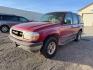1996 RED /CLOTH Ford Explorer (1FMDU34X7TU) with an 4L V-6 regular unleaded engine, Automatic transmission, located at 1175 N Woodruff Ave, Idaho Falls, ID, 83401, 43.506901, -111.999657 - Photo#1