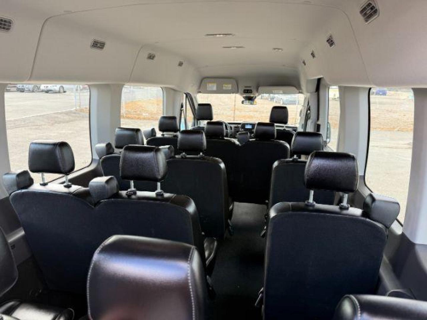 2021 Oxford White /Ebony Ford Transit-350 Passenger Van (1FBAX9C83MK) with an EcoBoost 35L V-6 gasoline direct injection engine, Automatic transmission, located at 1175 N Woodruff Ave, Idaho Falls, ID, 83401, 43.506901, -111.999657 - At Timberline Auto, finding a great deal on your next vehicle is always easy! Our experienced sales staff's goal is to help find you the right vehicle at the right price! Our knowledgeable finance department has options for almost any credit score. We offer extended service contract options to prote - Photo#28