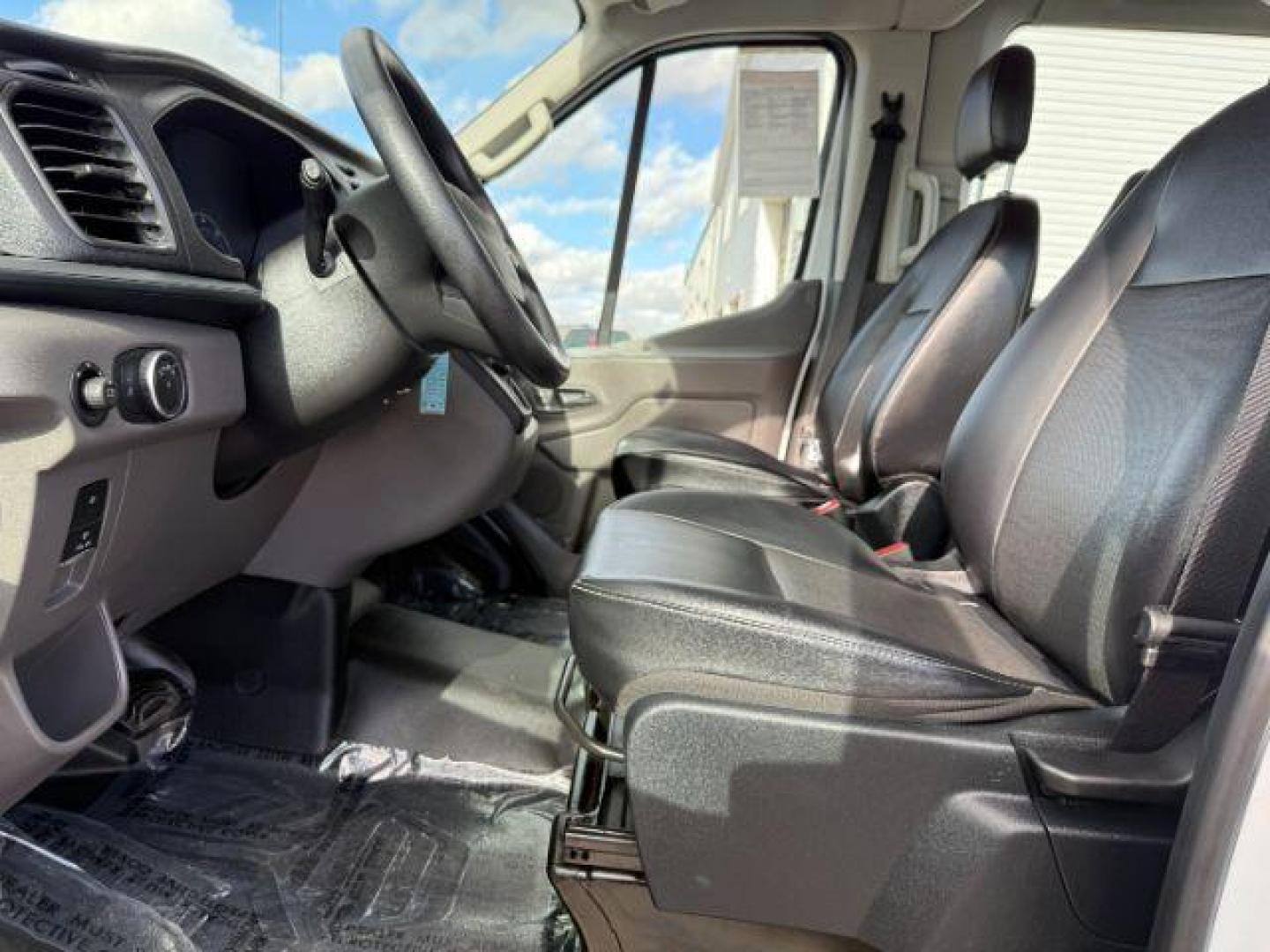 2021 Oxford White /Ebony Ford Transit-350 Passenger Van (1FBAX9C83MK) with an EcoBoost 35L V-6 gasoline direct injection engine, Automatic transmission, located at 1175 N Woodruff Ave, Idaho Falls, ID, 83401, 43.506901, -111.999657 - At Timberline Auto, finding a great deal on your next vehicle is always easy! Our experienced sales staff's goal is to help find you the right vehicle at the right price! Our knowledgeable finance department has options for almost any credit score. We offer extended service contract options to prote - Photo#35