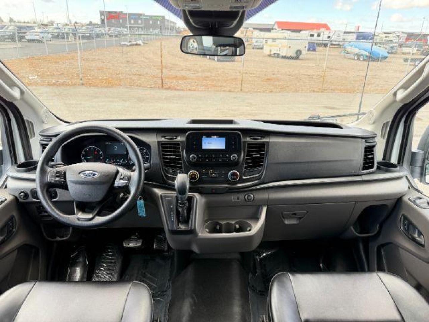 2021 Oxford White /Ebony Ford Transit-350 Passenger Van (1FBAX9C83MK) with an EcoBoost 35L V-6 gasoline direct injection engine, Automatic transmission, located at 1175 N Woodruff Ave, Idaho Falls, ID, 83401, 43.506901, -111.999657 - At Timberline Auto, finding a great deal on your next vehicle is always easy! Our experienced sales staff's goal is to help find you the right vehicle at the right price! Our knowledgeable finance department has options for almost any credit score. We offer extended service contract options to prote - Photo#42