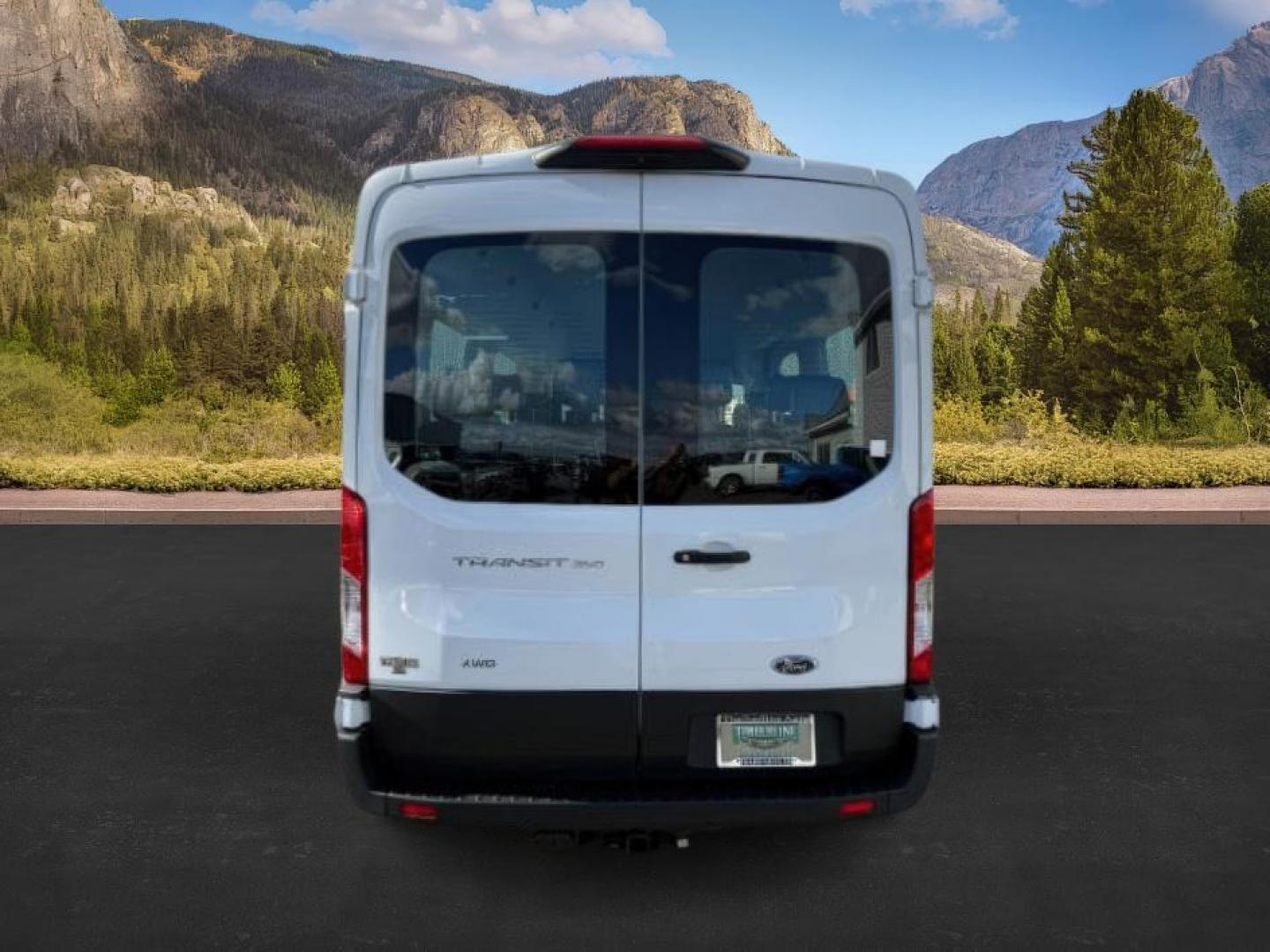 2021 Oxford White /Ebony Ford Transit-350 Passenger Van (1FBAX9C83MK) with an EcoBoost 35L V-6 gasoline direct injection engine, Automatic transmission, located at 1175 N Woodruff Ave, Idaho Falls, ID, 83401, 43.506901, -111.999657 - At Timberline Auto, finding a great deal on your next vehicle is always easy! Our experienced sales staff's goal is to help find you the right vehicle at the right price! Our knowledgeable finance department has options for almost any credit score. We offer extended service contract options to prote - Photo#3
